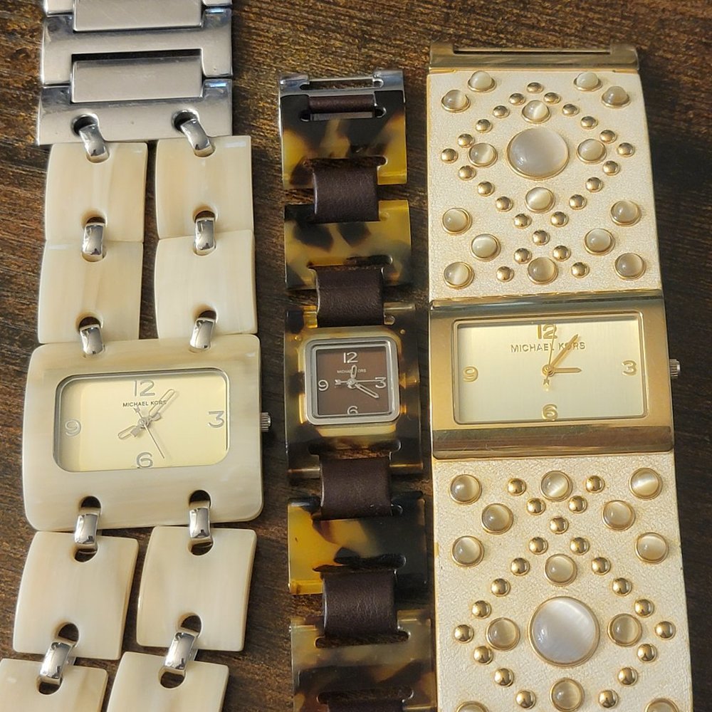 Three Michael Kors Watches